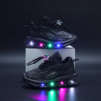 Black sneakers with colorful LED lights on a dark background